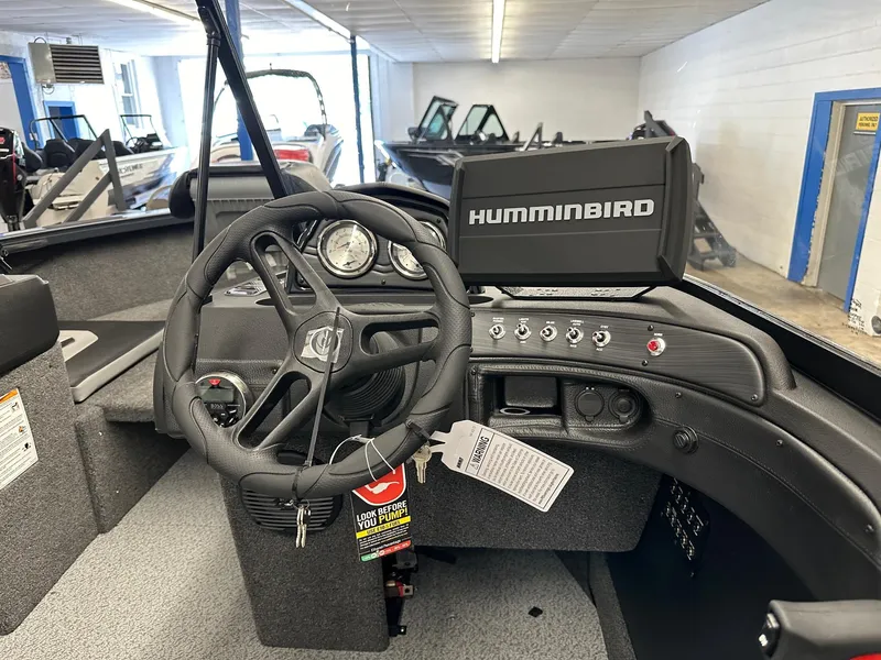 Slide: The Image of 2025 Crestliner 1950 Super Hawk boat dashboard with Humminbird navigation system. - 3