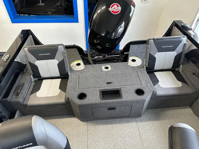 Slide: The Image of 2025 Crestliner 1950 Super Hawk boat interior with seating and storage. - 7