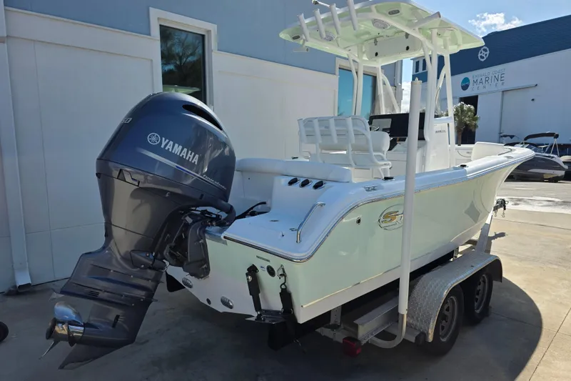 Slide: The Image of 2019 Sea Hunt Ultra 211 boat with Yamaha engine on trailer. - 4