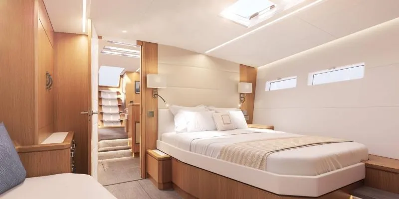 Slide: The Image of Luxurious interior of 2024 Jeanneau 60 yacht with elegant bedroom design. - 23
