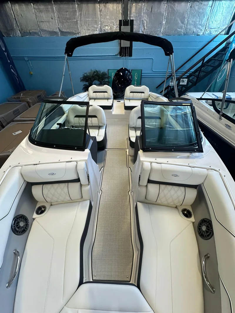 Slide: The Image of Control panel of 2025 Regal LX2 boat with various switches and labels. - 16