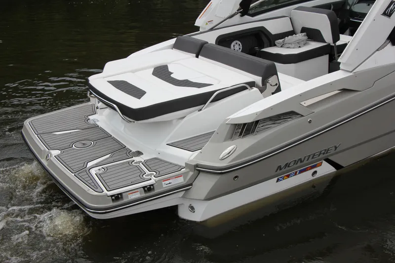 Slide: The Image of 2021 Monterey 298SS Super Sport control panel with switches and audio system. - 13