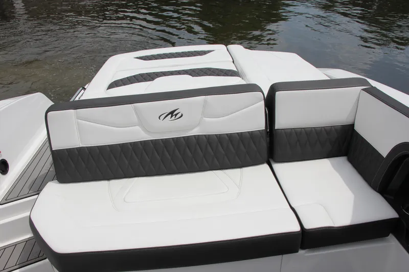 Slide: The Image of Aerial view of 2021 Monterey 298 SS boat on dark water. - 18