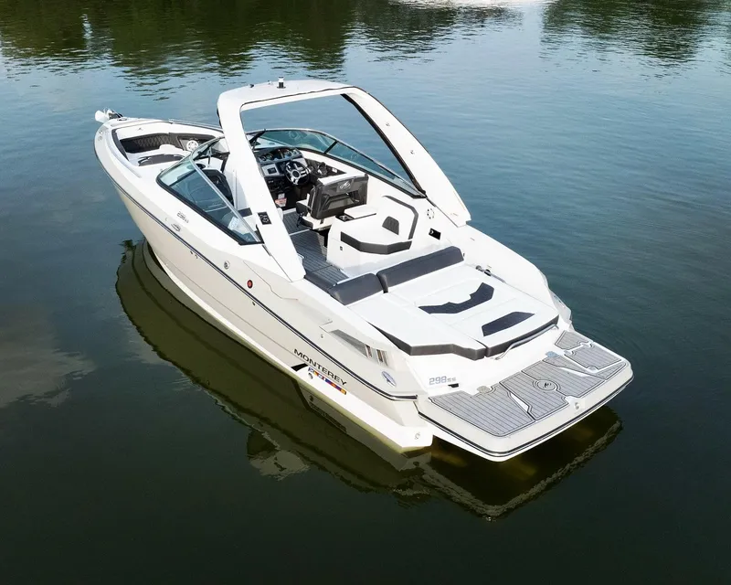 Slide: The Image of 2021 Monterey 298SS Super Sport boat on trailer, parked outdoors. - 3