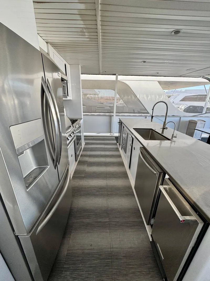 Slide: The Image of Modern kitchen on Adonia Just Add Water Trip #13, featuring stainless steel appliances, 2021. - 19