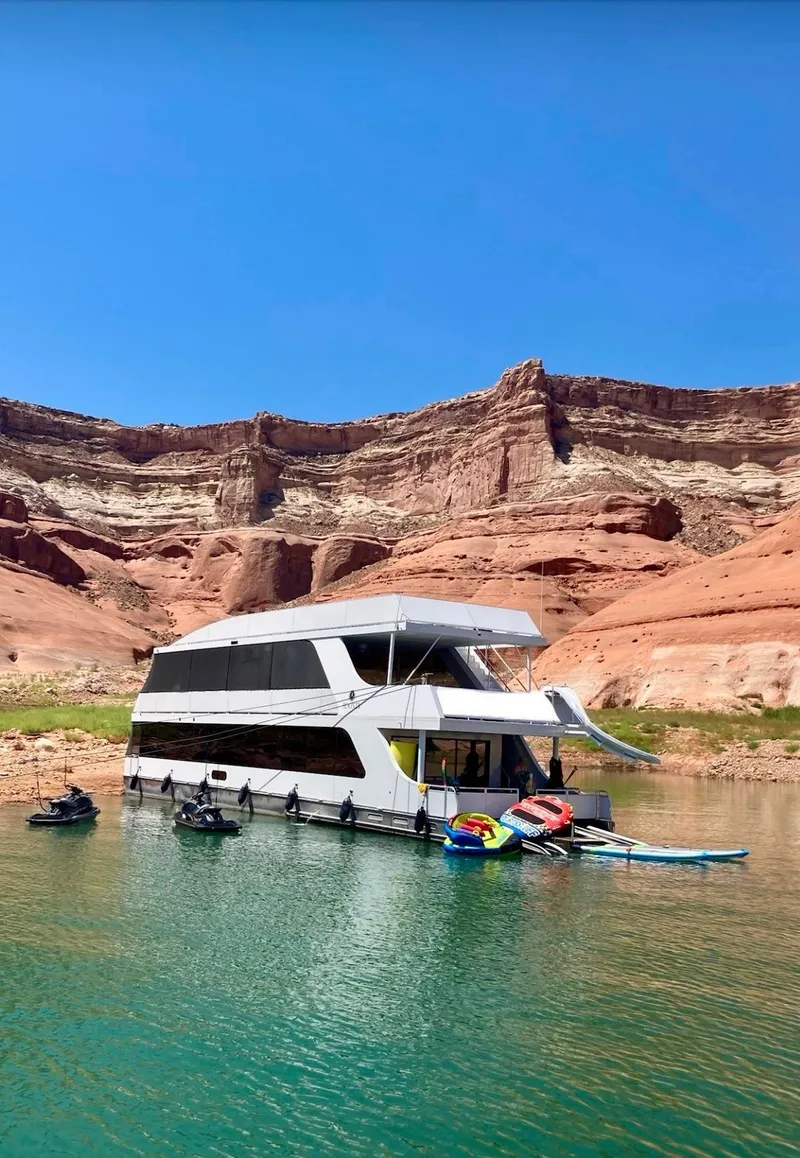 Slide: The Image of Houseboat "Adonia Just Add Water Trip #13" on scenic lake with red rock cliffs, 2021. - 2