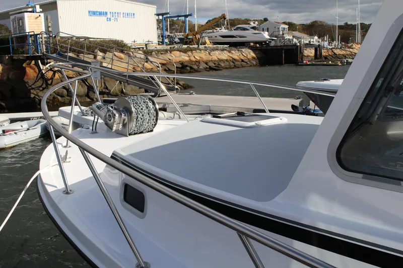 Slide: The Image of 2024 Steiger Craft 31 Miami boat docked at a marina. - 9