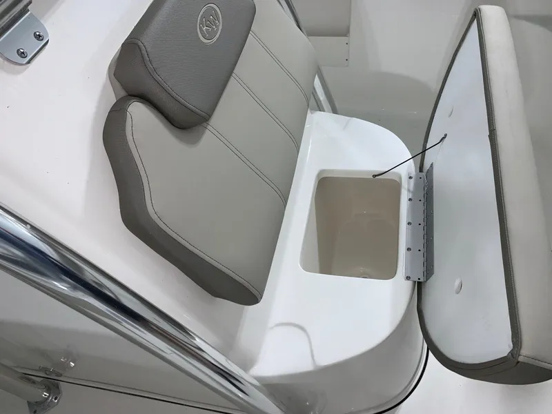 Slide: The Image of 2024 Key West 239 FS boat seat with storage compartment. - 15