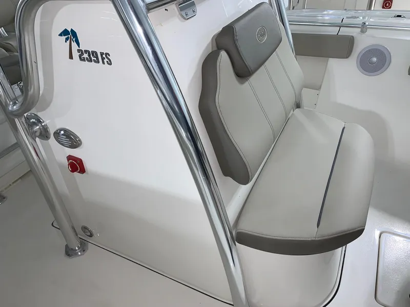 Slide: The Image of 2024 Key West 239 FS boat interior seating and console. - 16