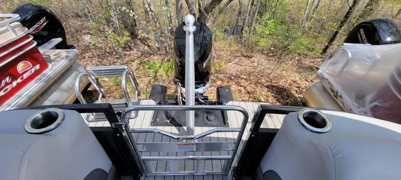 Slide: The Image of 2020 Ranger 2300LS boat rear view with motor and seating. - 13