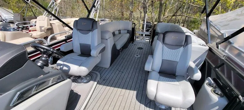 Slide: The Image of 2020 Ranger 2300LS boat interior with plush seating and modern design. - 4