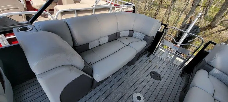 Slide: The Image of 2020 Ranger 2300LS boat with spacious gray seating and cup holder. - 8