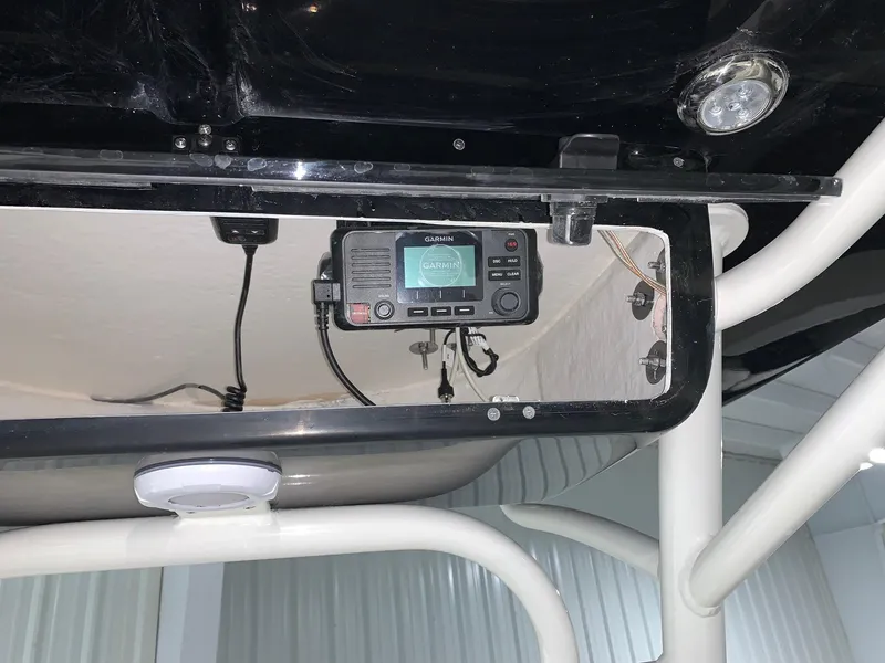 Slide: The Image of 2024 Key West 230 Bay Reef boat electronics and control panel. - 8