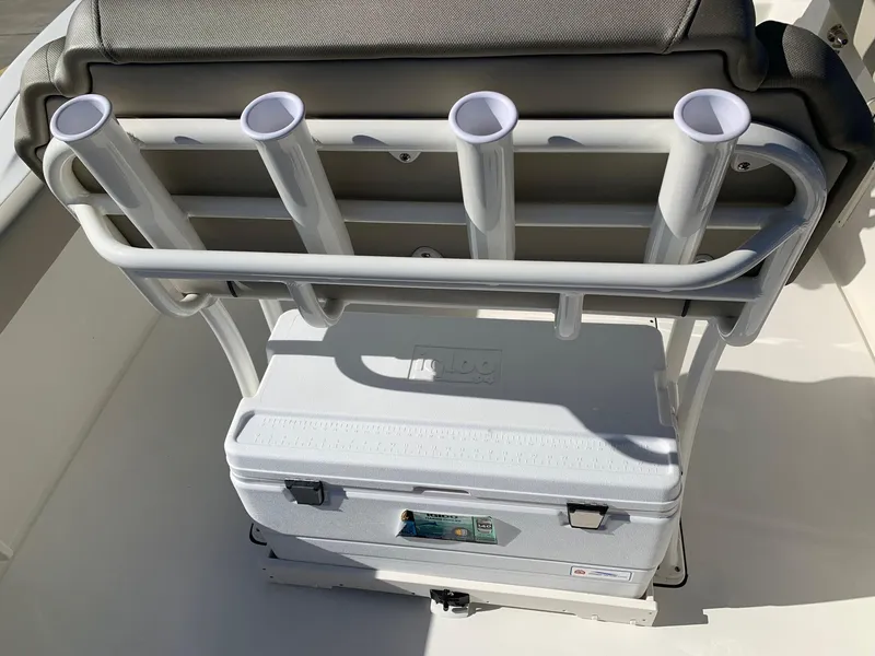 Slide: The Image of 2024 Key West 244 CC boat with rod holders and cooler. - 16