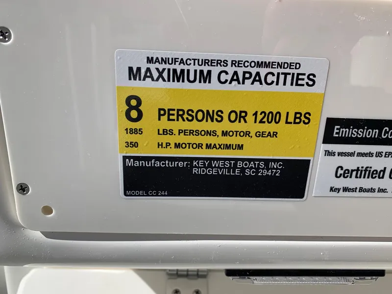 Slide: The Image of 2024 Key West 244 CC boat capacity label, 8 persons or 1200 lbs, 350 HP max. - 17