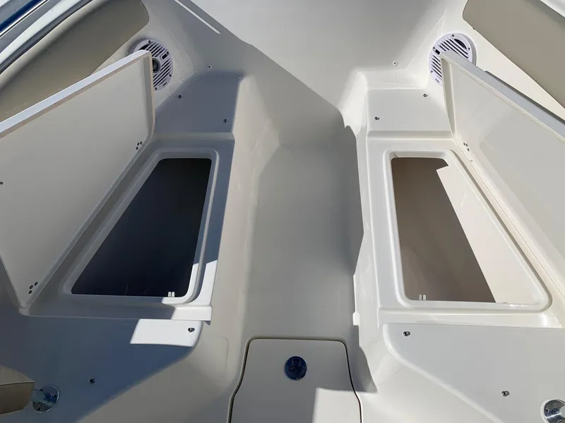 Slide: The Image of 2024 Key West 244 CC boat storage compartments. - 26