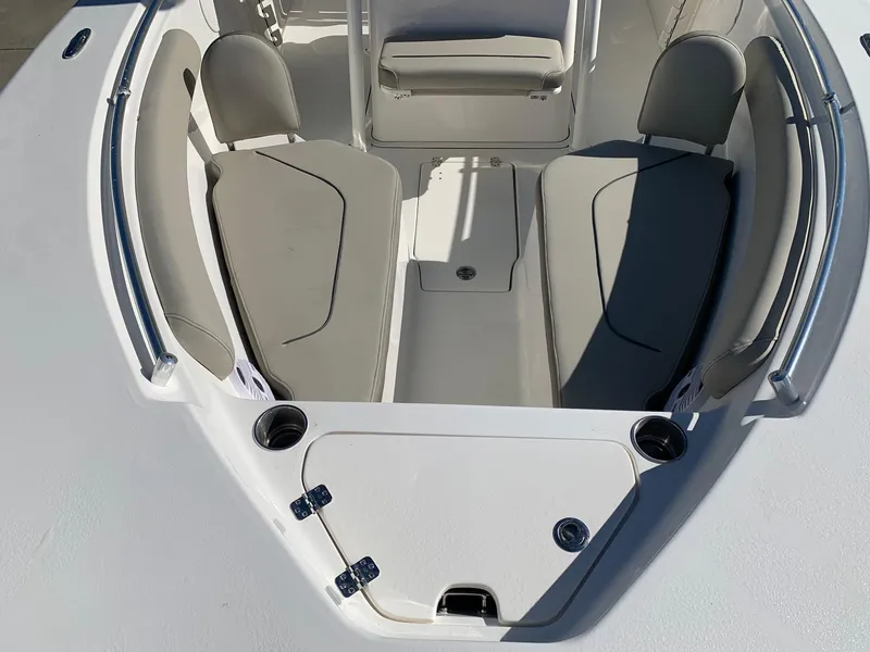 Slide: The Image of 2024 Key West 244 CC boat interior with seating and storage compartments. - 31