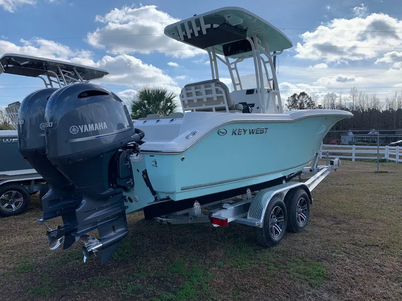 Slide: The Image of 2024 Key West 244 CC boat on a trailer with Yamaha outboard motor. - 2