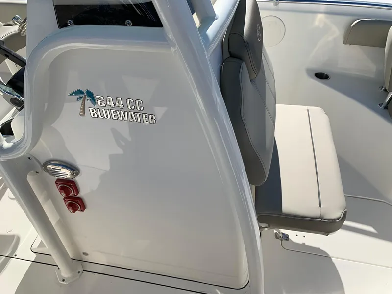 Slide: The Image of 2024 Key West 244 CC Bluewater boat interior with seating. - 21