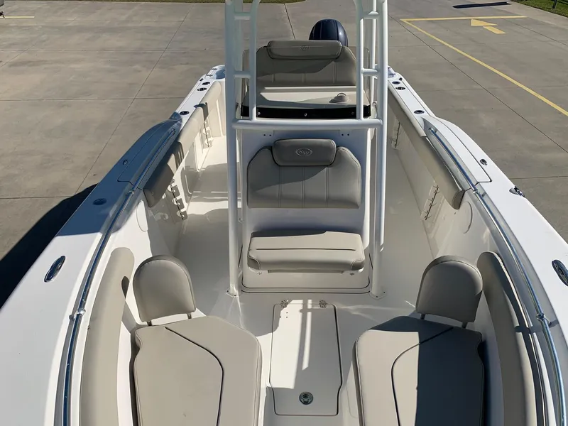Slide: The Image of 2024 Key West 244 CC boat interior with seating and console. - 28