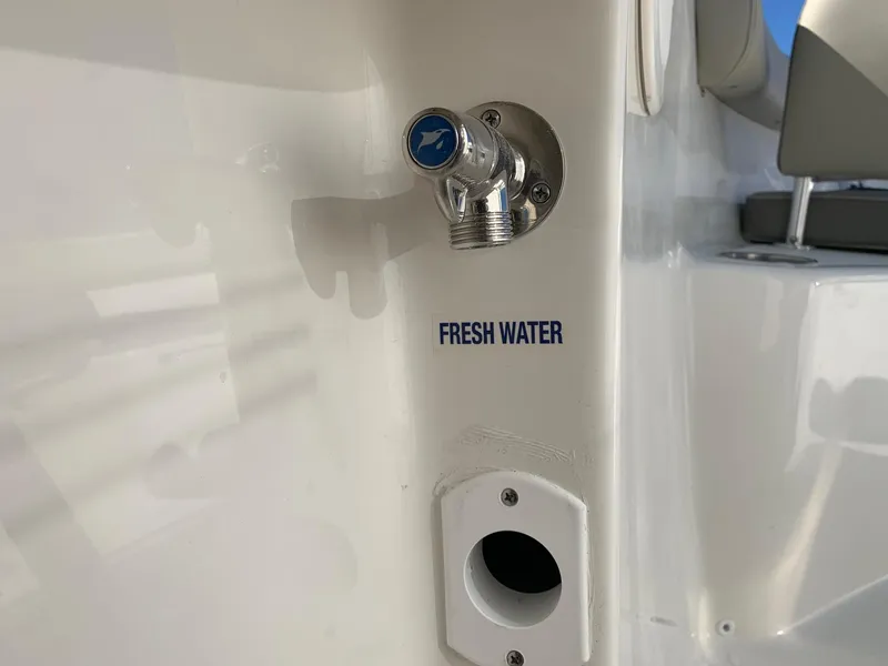Slide: The Image of Fresh water outlet on 2024 Key West 244 CC boat. - 33