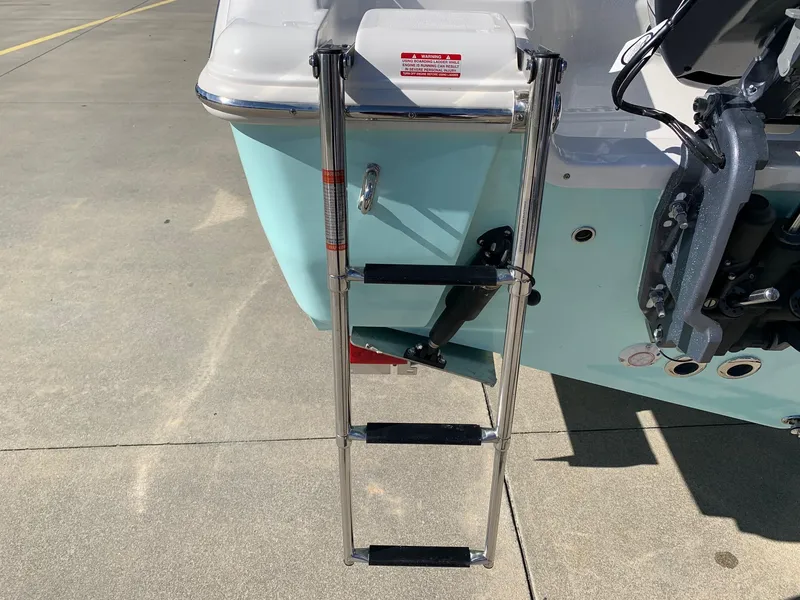 Slide: The Image of 2024 Key West 244 CC boat with extended swim ladder - 6