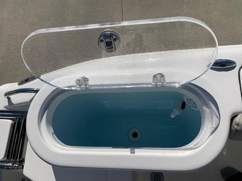Slide: The Image of 2024 Key West 244 CC livewell with open lid. - 9