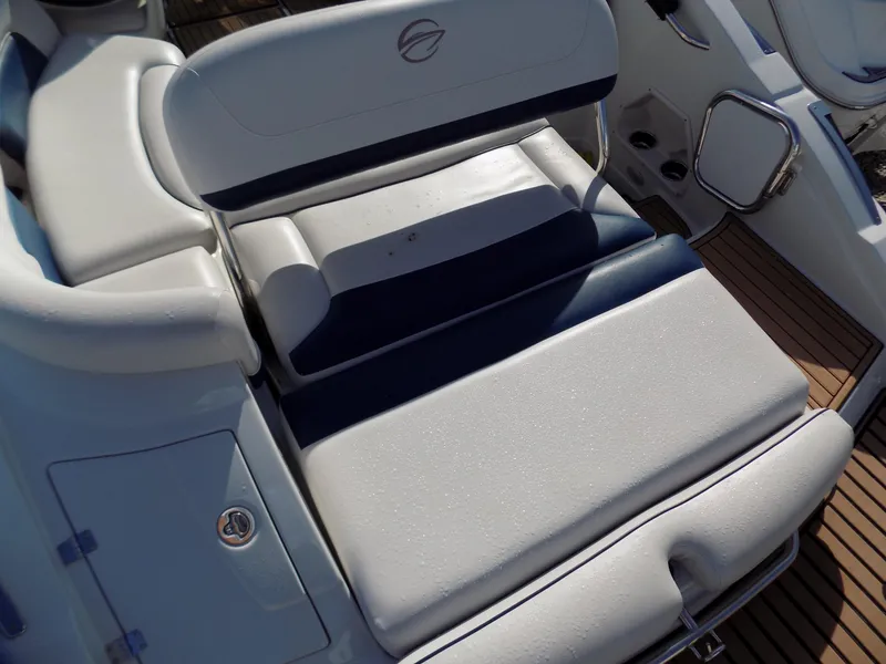 Slide: The Image of 2013 Crownline Eclipse E4 boat seating with white and navy upholstery. - 13