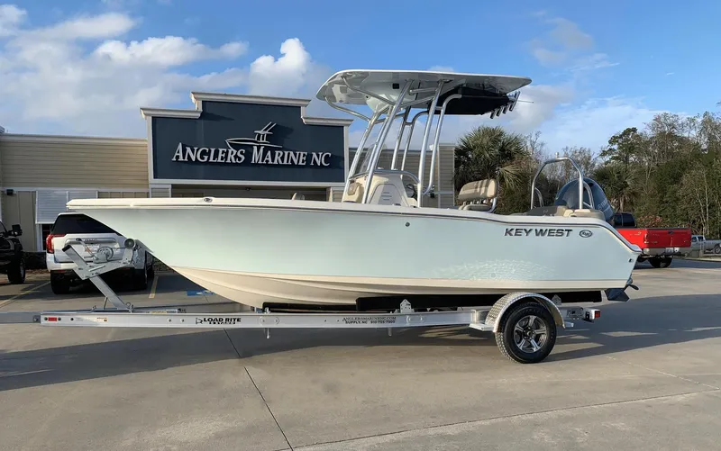 Slide: The Image of 2024 Key West 203 FS boat on trailer at Anglers Marine NC dealership. - 0