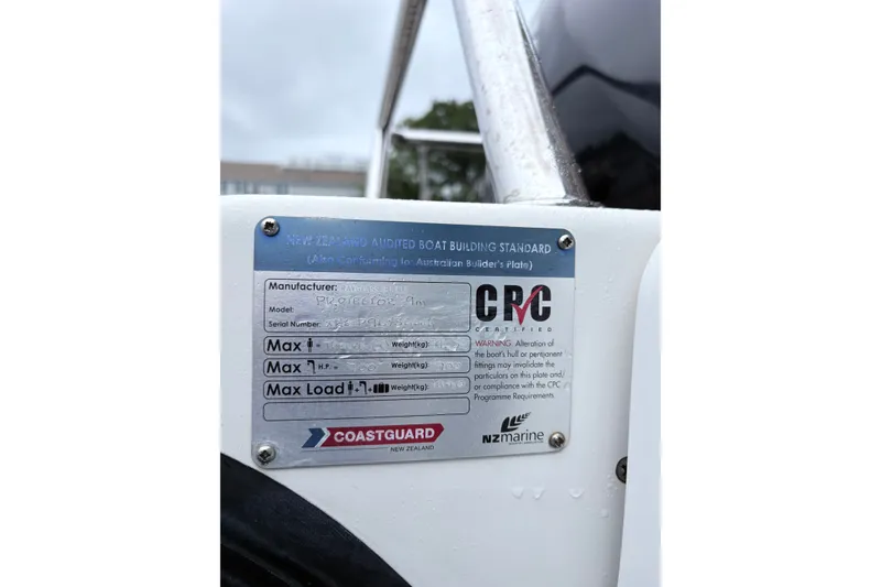 Slide: The Image of 2012 Protector Targa 30 boat compliance plate, displaying specifications and certification details. - 6
