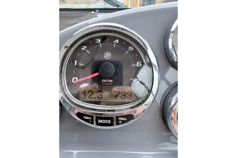 Slide: The Image of Close-up of a 2012 Protector Targa 30 tachometer displaying RPM, volts, and hours. - 7