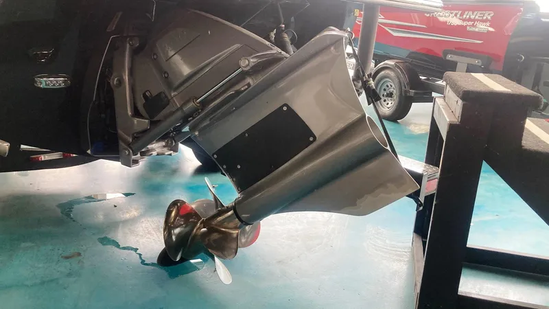 Slide: The Image of 2021 Regal LS2 Surf boat propeller and drive system on display. - 13