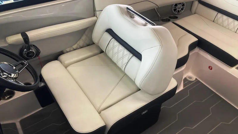 Slide: The Image of 2021 Regal LS2 Surf boat interior with luxurious seating and modern design. - 7