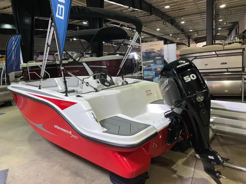 Slide: The Image of 2024 Bayliner Element M15 boat with a 50 HP Mercury engine on display. - 2