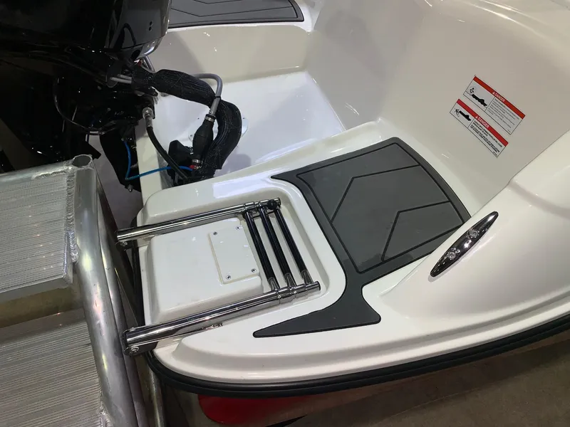 Slide: The Image of 2024 Bayliner Element M15 boat with swim platform and ladder. - 9