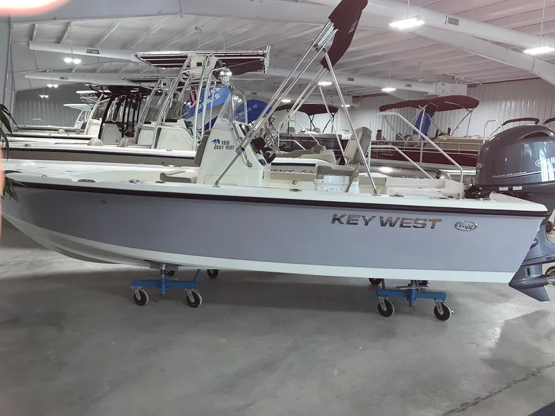Slide: The Image of 2024 Key West 188 Bay Reef boat in showroom. - 1