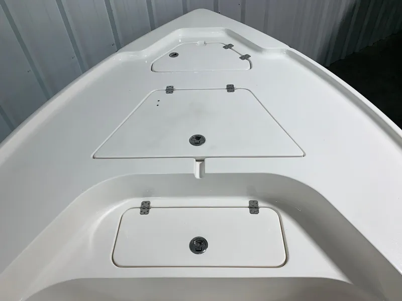 Slide: The Image of 2024 Key West 188 Bay Reef boat bow storage compartments. - 14