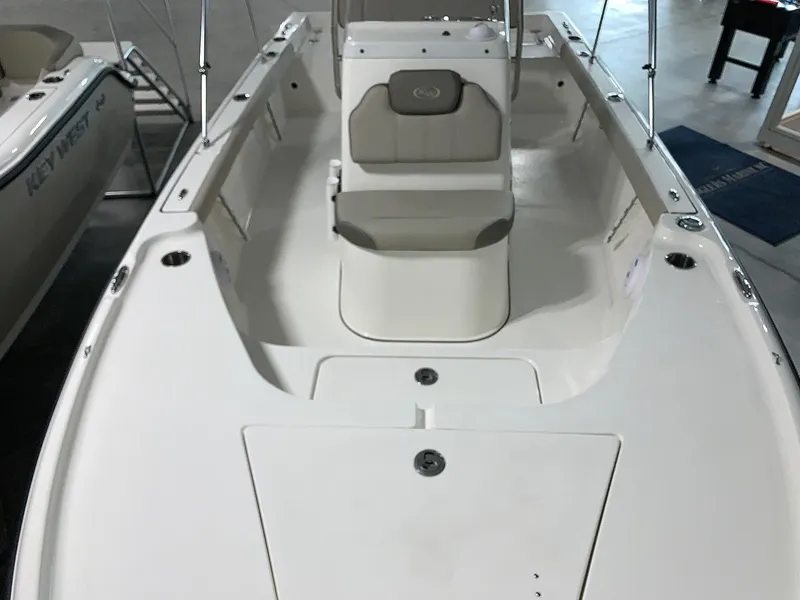 Slide: The Image of 2024 Key West 188 Bay Reef boat interior with center console and seating. - 15