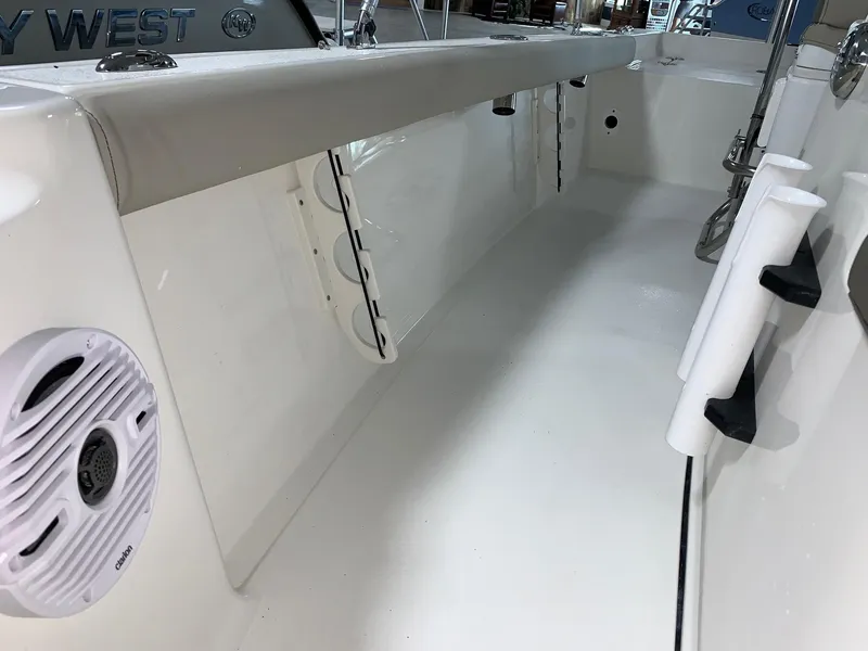 Slide: The Image of 2024 Key West 188 Bay Reef boat interior with white deck and seating. - 9