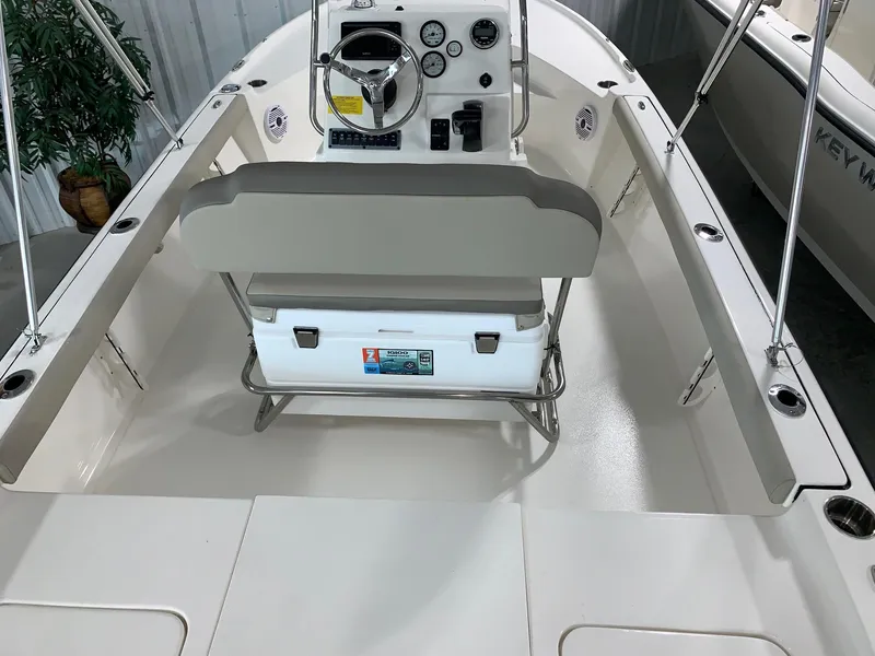 Slide: The Image of 2024 Key West 188 Bay Reef boat interior with console and seating. - 3