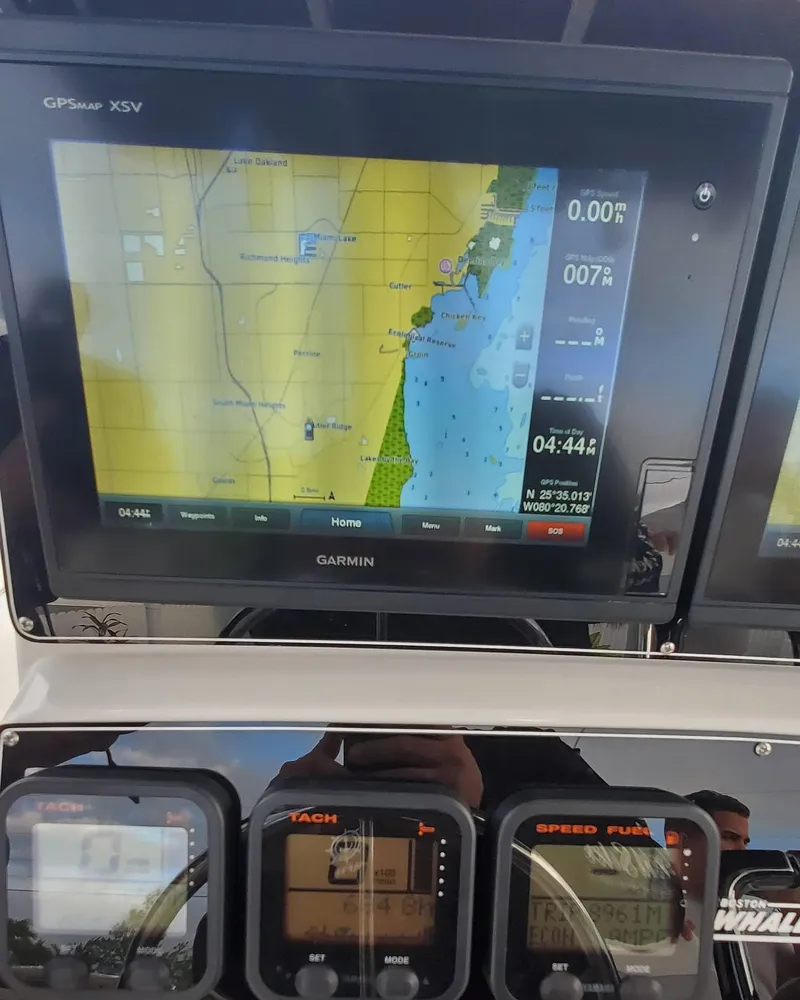 Slide: The Image of Garmin GPS display on 2001 Boston Whaler Outrage 26 CC boat dashboard. - 20
