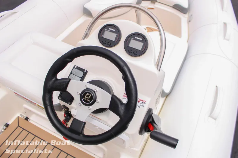 Slide: The Image of Zodiac Yachtline 440 2024 steering console with gauges and controls. - 3