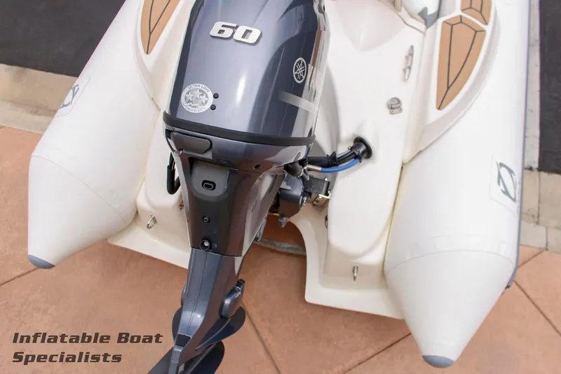 Slide: The Image of 2024 Zodiac Yachtline 440 inflatable boat with Yamaha 60 outboard motor. - 7