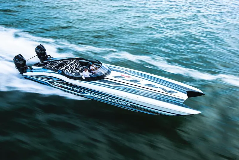 The Image of 2025 MTI 390X speedboat racing on water. - 0