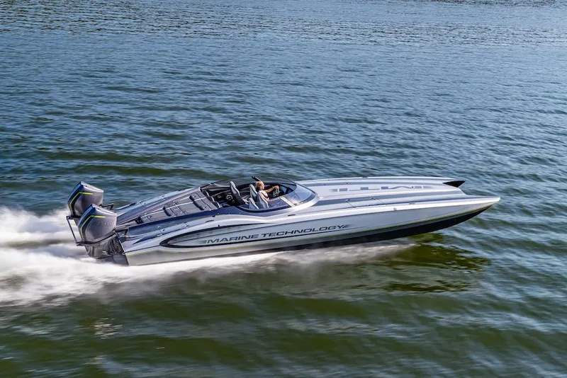 Slide: The Image of 2025 MTI 390X speedboat cruising on water. - 3