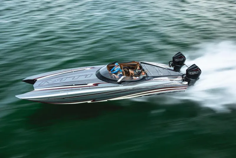 The Image of 2024 MTI 340X speedboat cruising on water with dual outboard engines. - 0