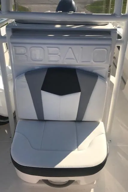 Slide: The Image of 2024 Robalo R200 Center Console boat seat with logo. - 10