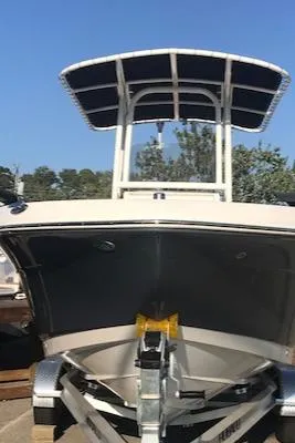 Slide: The Image of 2024 Robalo R200 Center Console boat on trailer. - 2