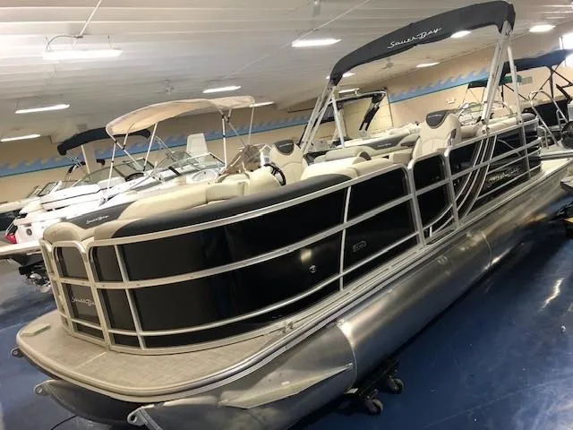 The Image of 2023 South Bay 224RS LE 2.75 pontoon boat in showroom. - 0
