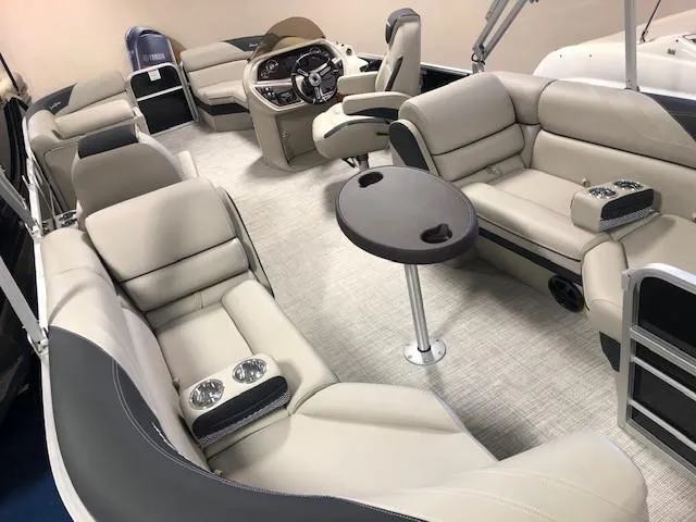 Slide: The Image of 2023 South Bay 224RS LE 2.75 pontoon boat interior with luxurious seating and modern helm. - 8